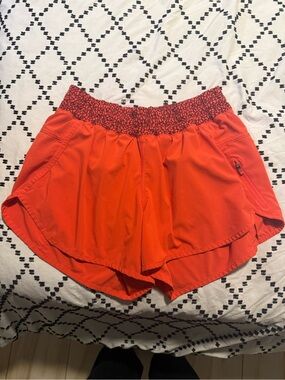 Lululemon Women’s Active Stretch Shorts in Bright Orange